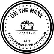 On The Mark logo